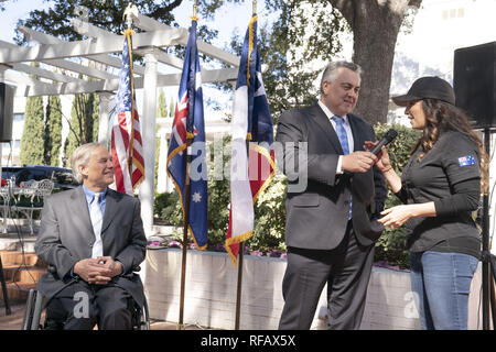 Austin, Texas, USA. 24th Jan, 2019. Ambassador Joe Hockey of Australia talks with Jess Payles of Melbourne as he visits with Texas Gov. Greg Abbott during the Great Mates Australia-Texas Barbecue at the Governor's Mansion. Abbott and Hockey worked to strengthen ties between the allies discussing agriculture and high tech before eating Australian vegemite burnt ends and heartbrand akaushi. Credit: Bob Daemmrich/ZUMA Wire/Alamy Live News Stock Photo