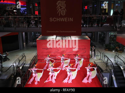 Berlin, Germany. 24th Jan, 2019. Dancers perform in a shopping mall at Potsdamer Platz in Berlin, capital of Germany, on Jan. 24, 2019. 'Happy Chinese New Year,' a series of Chinese cultural celebrations for the upcoming Spring Festival, kicked off in downtown Berlin on Thursday. Credit: Shan Yuqi/Xinhua/Alamy Live News Stock Photo