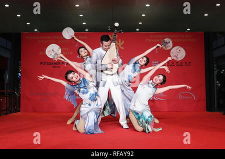 Berlin, Germany. 24th Jan, 2019. Artists perform in a shopping mall at Potsdamer Platz in Berlin, capital of Germany, on Jan. 24, 2019. 'Happy Chinese New Year,' a series of Chinese cultural celebrations for the upcoming Spring Festival, kicked off in downtown Berlin on Thursday. Credit: Shan Yuqi/Xinhua/Alamy Live News Stock Photo