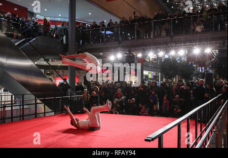 Berlin, Germany. 24th Jan, 2019. Acrobats perform in a shopping mall at Potsdamer Platz in Berlin, capital of Germany, on Jan. 24, 2019. 'Happy Chinese New Year,' a series of Chinese cultural celebrations for the upcoming Spring Festival, kicked off in downtown Berlin on Thursday. Credit: Shan Yuqi/Xinhua/Alamy Live News Stock Photo