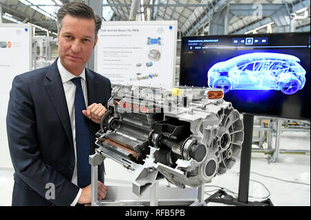 Salzgitter, Germany. 25th Jan, 2019. Thomas Schmall, Chairman of the Board of Management of Volkswagen Group Components, is standing next to the model of the APP310-2.0 electric drive in a production hall at the VW plant in Salzgitter. The division includes 61 component plants with 80,000 employees at 47 locations, which manufacture engines and transmissions, for example. According to Volkswagen, the division is one of the world's largest automotive suppliers. Credit: Holger Hollemann/dpa/Alamy Live News Stock Photo