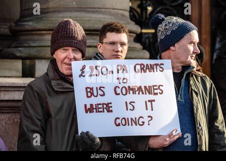 Glasgow, Renfrewshire, UK. 24th Jan, 2019. Protesters seen holding a placard during the rally.The organization called Get Glasgow Moving held a protest outside of the City Chambers in Glasgow before handing over a box containing 10,727 signatures to members of the Council, saying that the transport should not be in the hands of private companies but in the publics. Credit: Stewart Kirby/SOPA Images/ZUMA Wire/Alamy Live News Stock Photo