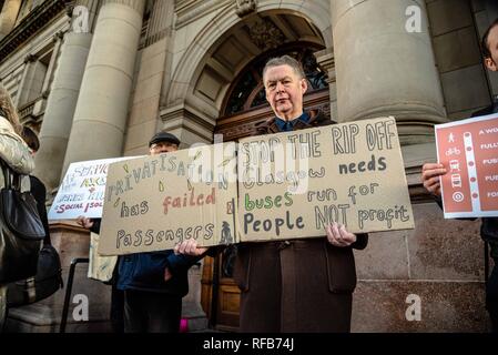 Glasgow, Renfrewshire, UK. 24th Jan, 2019. Protesters seen holding placards during the rally.The organization called Get Glasgow Moving held a protest outside of the City Chambers in Glasgow before handing over a box containing 10,727 signatures to members of the Council, saying that the transport should not be in the hands of private companies but in the publics. Credit: Stewart Kirby/SOPA Images/ZUMA Wire/Alamy Live News Stock Photo