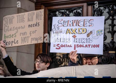 Glasgow, Renfrewshire, UK. 24th Jan, 2019. Protesters seen holding placards during the rally.The organization called Get Glasgow Moving held a protest outside of the City Chambers in Glasgow before handing over a box containing 10,727 signatures to members of the Council, saying that the transport should not be in the hands of private companies but in the publics. Credit: Stewart Kirby/SOPA Images/ZUMA Wire/Alamy Live News Stock Photo