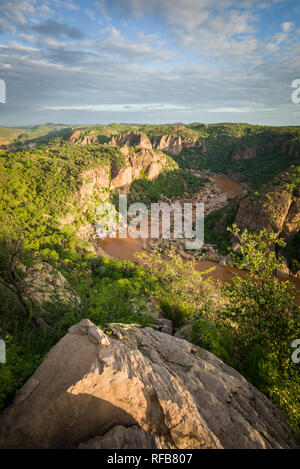 Lanner Gorge, carved by the Luvuvhu River, in the Pafuri region in the north of Kruger National Park, is a stunning destination for a safari sundowner Stock Photo