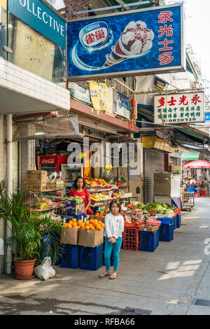 A fresh fruit market in the small fishing village of  Yung Shue Wan on Lamma Island, Hong Kong, China, Asia. Stock Photo