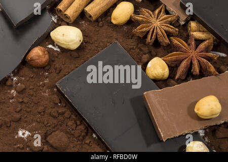 Dark chocolate with hazelnuts and cocoa powder Stock Photo