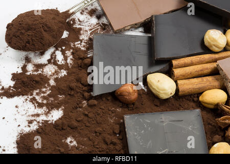 Dark chocolate with hazelnuts and cocoa powder Stock Photo