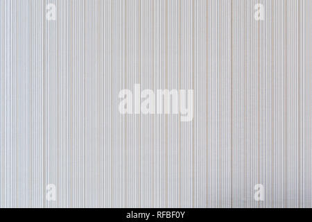 High resolution full frame background of pale and beige colored striped wallpaper. Stock Photo