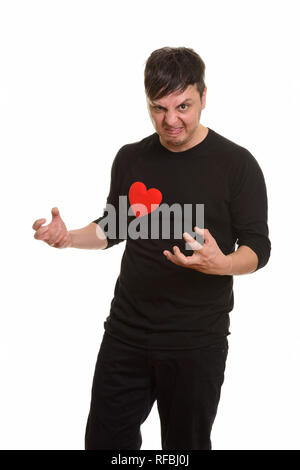 Studio shot of crazy Caucasian man looking angry ready for Valen Stock Photo