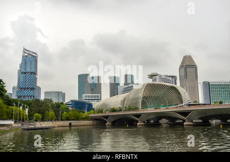 Singapore, Southeast Asia - December 15, 2018: Esplanade - Theaters on the Bay skyline and modern urban buildings on business district bay. Stock Photo