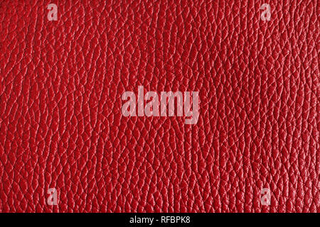 Claret red colored cow leather texture. Closeup Stock Photo