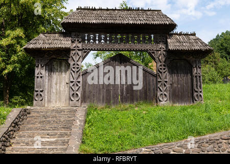 Barsana Monastery Architectural Detail - Traditional Wooden Carved Gate (Maramures, Romania). Stock Photo