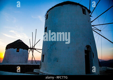 famous view  Traditional windmills on the island Mykonos, Greece Stock Photo