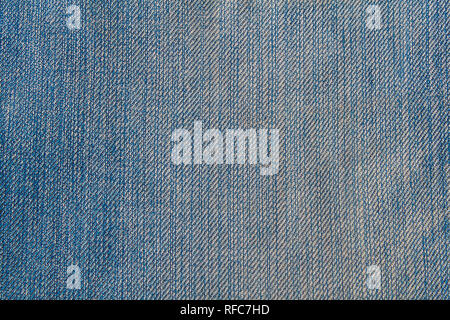 Perspective and closeup view to abstract space of empty blue natural clean denim texture for the traditional business background in cold bright colors Stock Photo