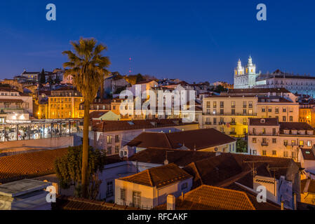 Evening falls over the Alfama district in Lisbon, Portugal, View from Miradouro Das Portas Do Sol Stock Photo