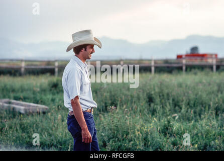 Young Ranch hand out on the Open Range, MT, USA Stock Photo