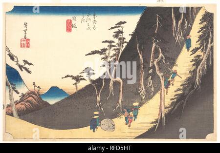 Nissaka-sayo no Naka Yama  Station Twenty-six: Nissaka, Sayo no Nakayama, from the Fifty-three Stations of the Tokaido. Artist: Utagawa Hiroshige (Japanese, Tokyo (Edo) 1797-1858 Tokyo (Edo)). Culture: Japan. Dimensions: 9 3/8 x 14 3/8 in. (23.8 x 36.5 cm). Date: ca. 1833-34.  Travelers pass the famous Night-Weeping Stone (yonaki-ishi) near a steep uphill course to Nissaka. According to legend, a pregnant woman was killed by bandits, and her blood fell on the stone. Ever since, the stone has cried out every night for her. The magnificent, sharp slope at the right is boldly contrasted with the  Stock Photo