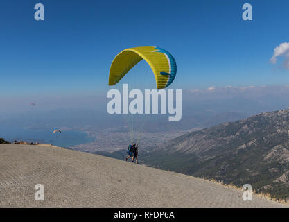 Babadag, Turkey - standing 2000 meters above the sea level, and right beside the Mediterranean Sea, the Mount Babadag is an ideal spot for paragliding Stock Photo