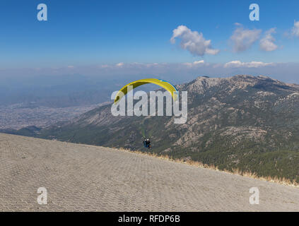 Babadag, Turkey - standing 2000 meters above the sea level, and right beside the Mediterranean Sea, the Mount Babadag is an ideal spot for paragliding Stock Photo