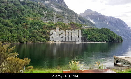 Manapouri Hydro Power Station at Manapouri Lake, New Zealand, South Island, NZ Stock Photo