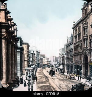 Vintage late 19th century hand tinted photograph showing St. Mary's Street in Cardiff, the capital City of Wales. Stock Photo