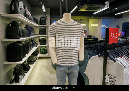 CALVIN KLEIN JEANS CLOTHING ON DISPLAY INSIDE THE FASHION STORE