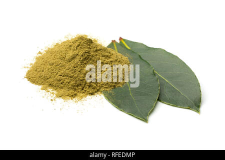 Heap of ground bay laurel and whole bay laurel leaves isolated on white background Stock Photo