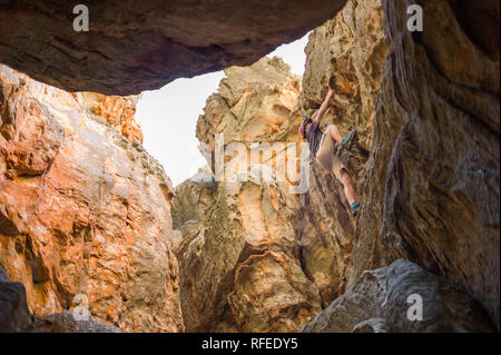 Wolfberg Mountain in the Cederberg Wilderness Area is home to a  hiking or backpacking trail leading through Wolfberg Cracks to famous Wolfberg Arch. Stock Photo
