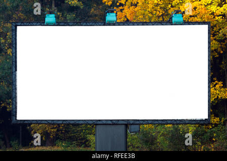 Blank billboard with copyspace surrounded by forest outdoors in the ...