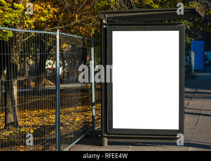 Blank bus stop advertisement billboard in urban city environment. Transportation blank white isolated ad space Stock Photo