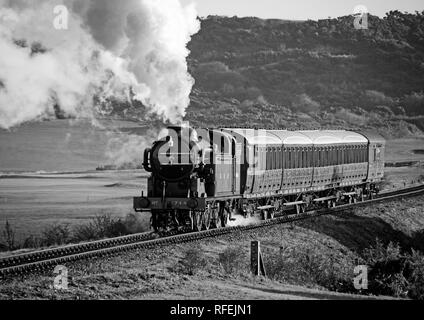 Ex GNR N2 class loco and a Gresley designed Quad-Art set of articulated suburban carriages recreate a commuter train from the mid-1920's. Stock Photo