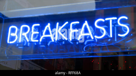 Blue Breakfasts neon sign, Oldham street cafe, central Manchester, Northern Quarter, England, UK Stock Photo