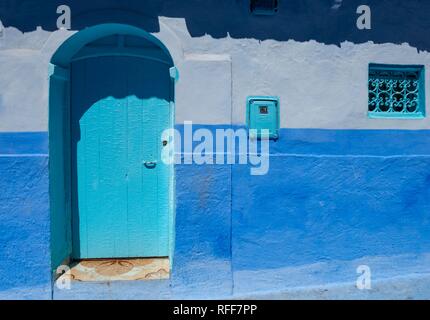 Blue entrance door, blue house, Medina of Chefchaouen, Chaouen, Tangier-Tétouan, Morocco Stock Photo