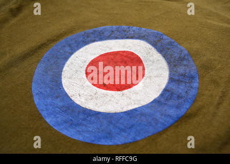 British RAF, Royal Air Force roundel on fabric garment. Red white and blue circular motif on clothing. Popular sixties mod target design Stock Photo