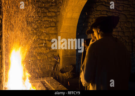 Blacksmith forging in the traditional way, as in the past, in the Legazpi smithy Stock Photo