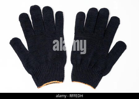 Closeup pair of black textile knitted gloves with professional blue rubber protective anti-slip coating isolated on white background. Concept builder, Stock Photo