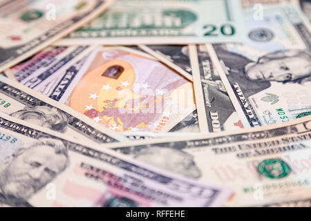 Closeup lot of american dollar and euro banknotes, cash. Concept leap, fall, rate, currency exchange, debt, profit, loss, sanctions, appreciation of g Stock Photo
