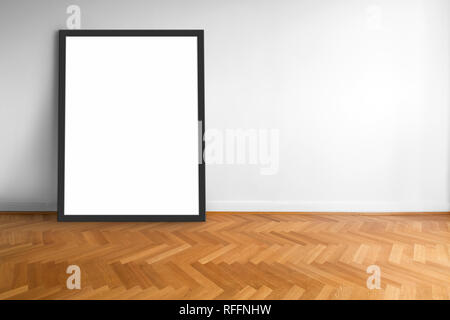 empty picture frame on wooden  floor white wall background Stock Photo
