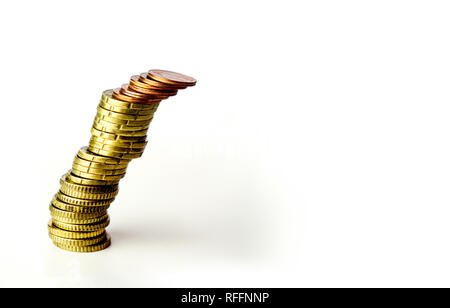 leaning tilt stack of coins on isolaed white background - risky business concept Stock Photo
