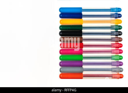 group of multicolored pens in a row Stock Photo