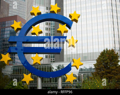A Euro sculpture, designed by artist Ottmar Hörl, outside the Eurotower in Frankfurt, Germany. Stock Photo