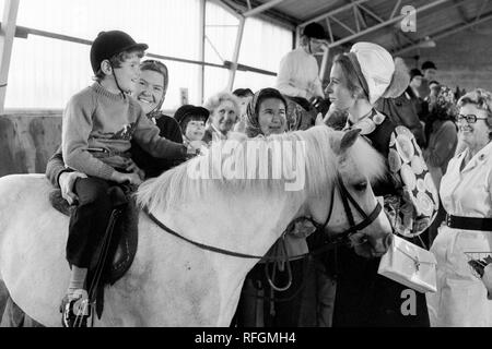 Princess Anne chats with a young rider during her visit to the Winford Orthopaedic Hospital in Bristol. The Princess Royal visited the hospital as Patron of the national Riding for the Disabled Association, of which the hospital is a member. Stock Photo