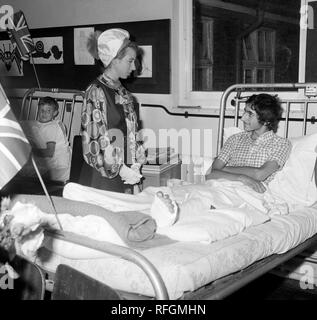 Princess Anne chats with a patient during her visit to the Winford Orthopaedic Hospital in Bristol. The Princess Royal toured four of the wards before watching a display of riding and mounted exercises by pupils of the national Riding for the Disabled Association, of which the Princess is a patron. Stock Photo