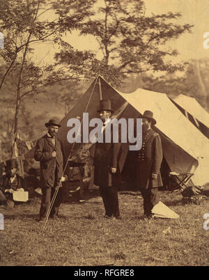 [President Abraham Lincoln, Major General John A. McClernand (right), and E. J. Allen (Allan Pinkerton, left), Chief of the Secret Service of the United States, at Secret Service Department, Headquarters Army of the Potomac, near  Antietam, Maryland]. Artist: Alexander Gardner (American, Glasgow, Scotland 1821-1882 Washington, D.C.). Dimensions: Image: 22.4 x 18 cm (8 13/16 x 7 1/16 in.)  Mount: 29.2 x 20.7 cm (11 1/2 x 8 1/8 in.). Person in Photograph: Abraham Lincoln (American, Hardin County, Kentucky 1809-1865 Washington, D.C.); John Alexander McClernand (American, Breckinridge County, Kent Stock Photo