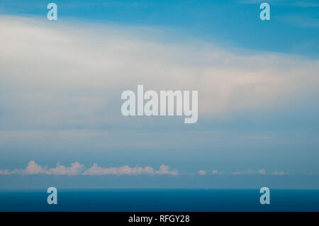 Dreamlike seascape and tall skies in the Mediterranean north coast of Gozo, Malta. Layout space for copy. Stock Photo