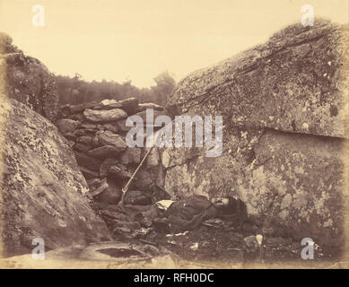 Home of a Rebel Sharpshooter, Gettysburg. Date/Period: Negative July 1863; print 1866. Print. Albumen silver. Height: 176 mm (6.92 in); Width: 230 mm (9.05 in). Author: Alexander Gardner. Stock Photo