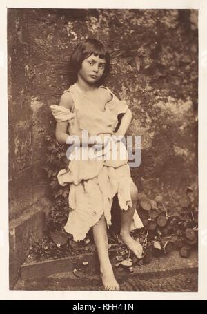 Alice Liddell as 'The Beggar Maid'. Artist: Lewis Carroll (British, Daresbury, Cheshire 1832-1898 Guildford). Dimensions: Image: 16.3 x 10.9cm (6 7/16 x 4 5/16in.)  Mount: 14 1/8 in. × 10 7/8 in. (35.8 × 27.6 cm). Subject: Alice Pleasance Liddell (British, 1852-1934). Date: 1858.  Known primarily as the author of children's books, Lewis Carroll was also a lecturer in mathematics at Oxford University and an ordained deacon. He took his first photograph in 1856 and pursued photography obsessively for the next twenty-five years, exhibiting and selling his prints. He stopped taking pictures abrupt