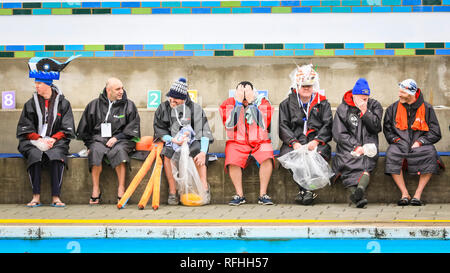 Swimmers await their race. The 8th UK Cold Water Swimming Championships get under way at Tooting Bec Lido in South London. Over 700 swimmers and dippers in various categories are cheered on by the crowds, including 30-yards traditional ‘head-up' breaststroke, 30m ice fly, 90m freestyle dash and the ‘Big Splash' Crisis charity jump-in with over 70 hardy dippers, in aid of the homeless charity. The Swimmers brave water temperatures of 2-3 degrees. Credit: Imageplotter News and Sports/Alamy Live News Stock Photo