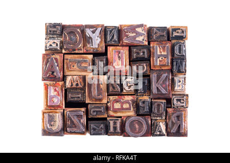 Old wooden block letters isolated on white background Stock Photo